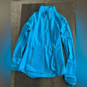 Older small lululemon define jacket in a bright blue color